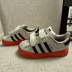 Adidas Kids Sneakers - Orange and Black Drip Design - superstars